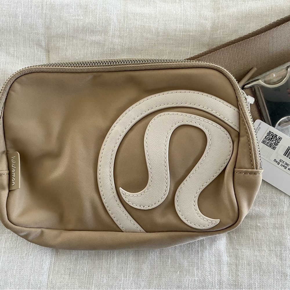 NWT lululemon athletica tan Everywhere belt bag with cream logo